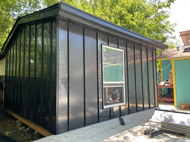 Black standing seam metal wall panels for Metal Roof Installation in Rocky River